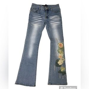 🌸.    #463-24.   Jeans with flowers on the left side bx 24